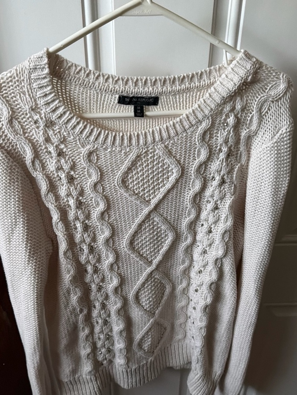 Banana Republic cream cable knit sweater with diamond-shaped lace-like patterns,